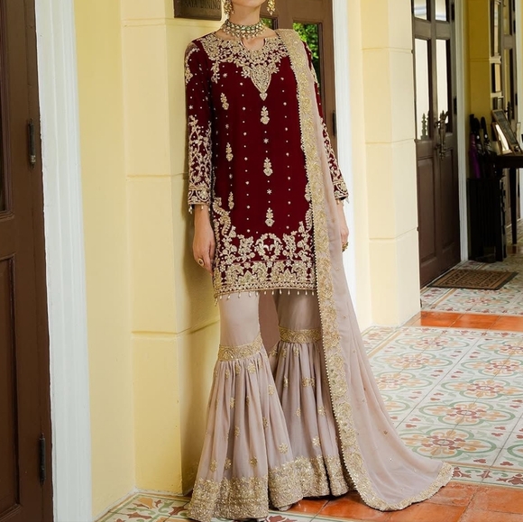 Elegant Maroon and Gold Embroidered Dress